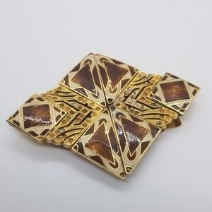 vintage Sandor Co gold tone and enamel belt buckle